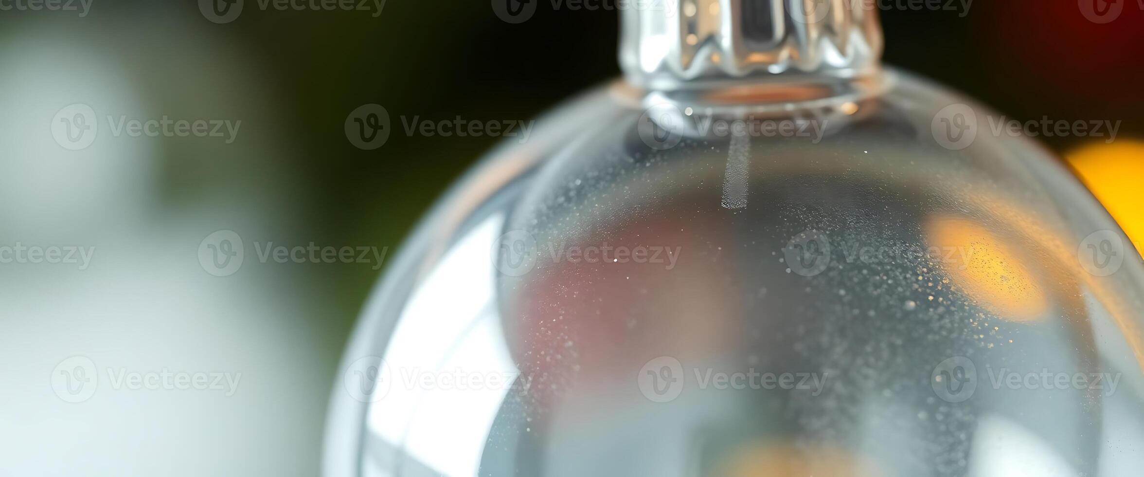 close up of a glass bottle with water on it photo
