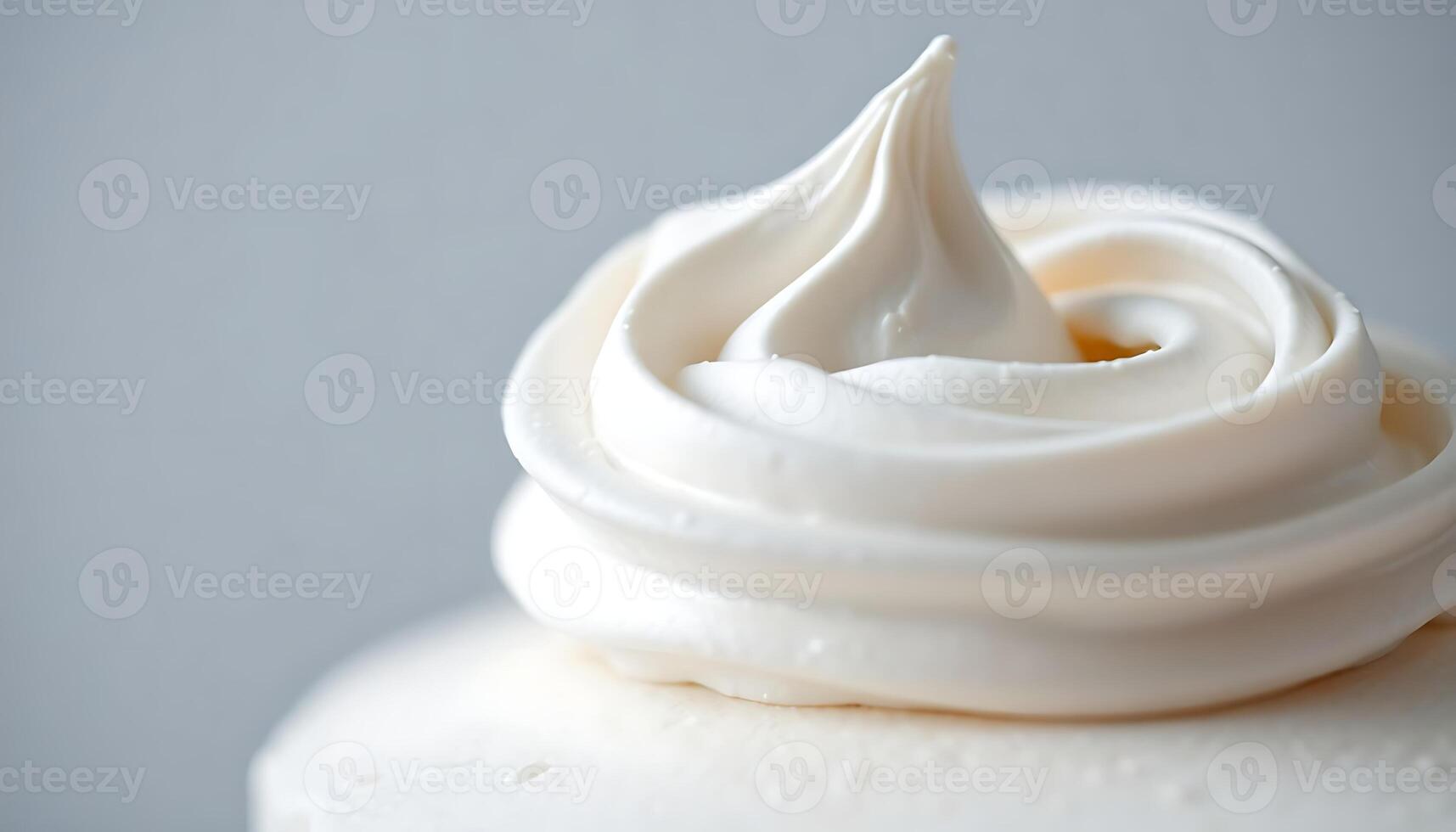 close up of a frosted cupcake with icing photo