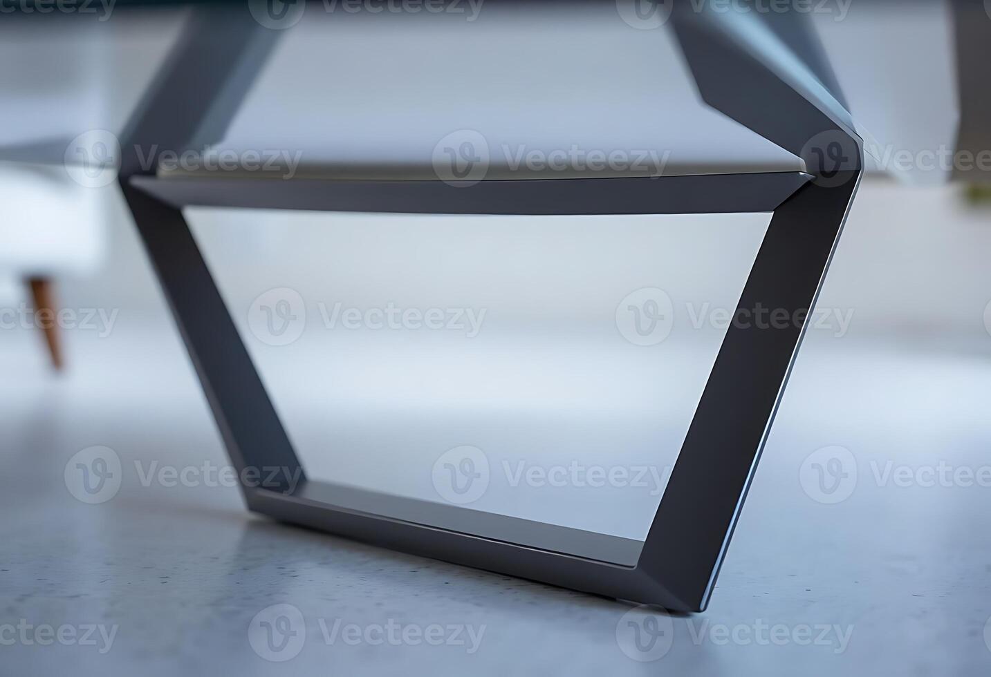 close up of a glass table with a chair in the background photo