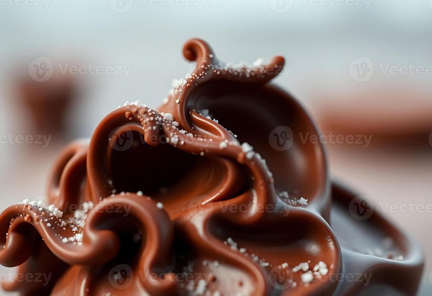 close up of a chocolate cupcake with icing photo