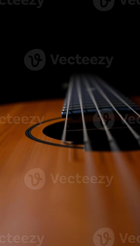 close up of an acoustic guitar strings photo