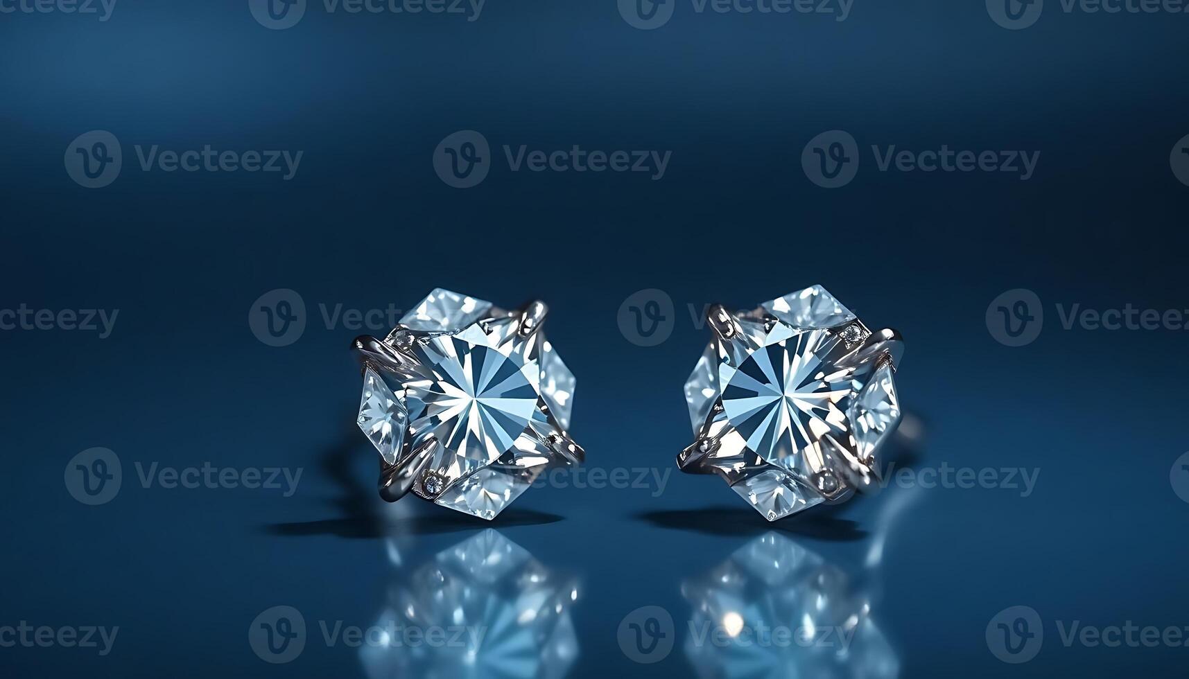 pair of diamond earrings on a blue background photo