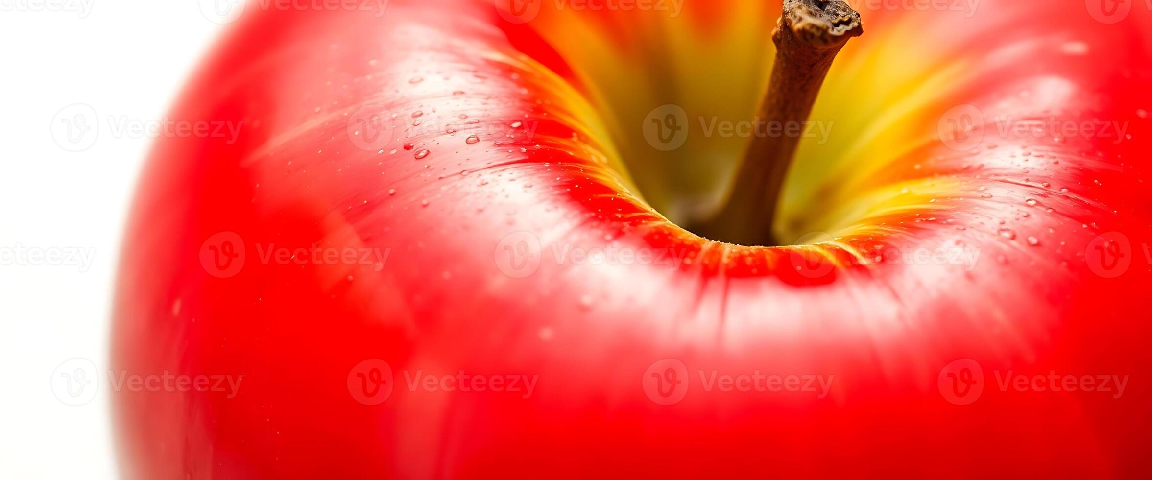 close up of a red apple with a yellow center photo