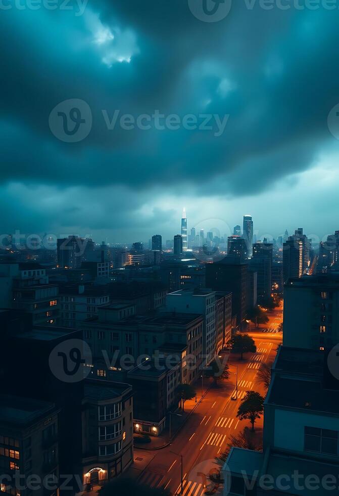 view of a city at night from the top of a building photo