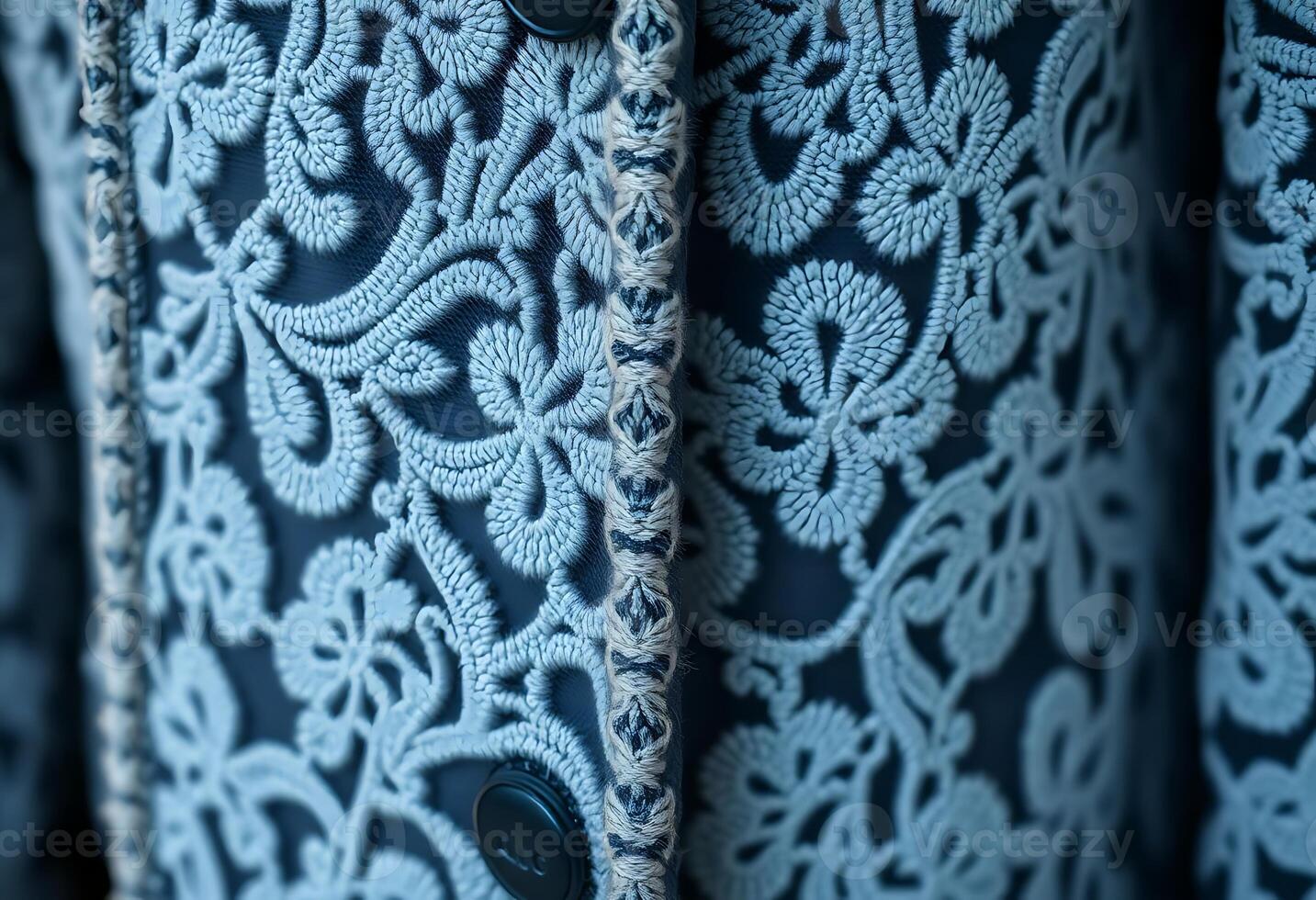 close up of a blue jacket with buttons photo