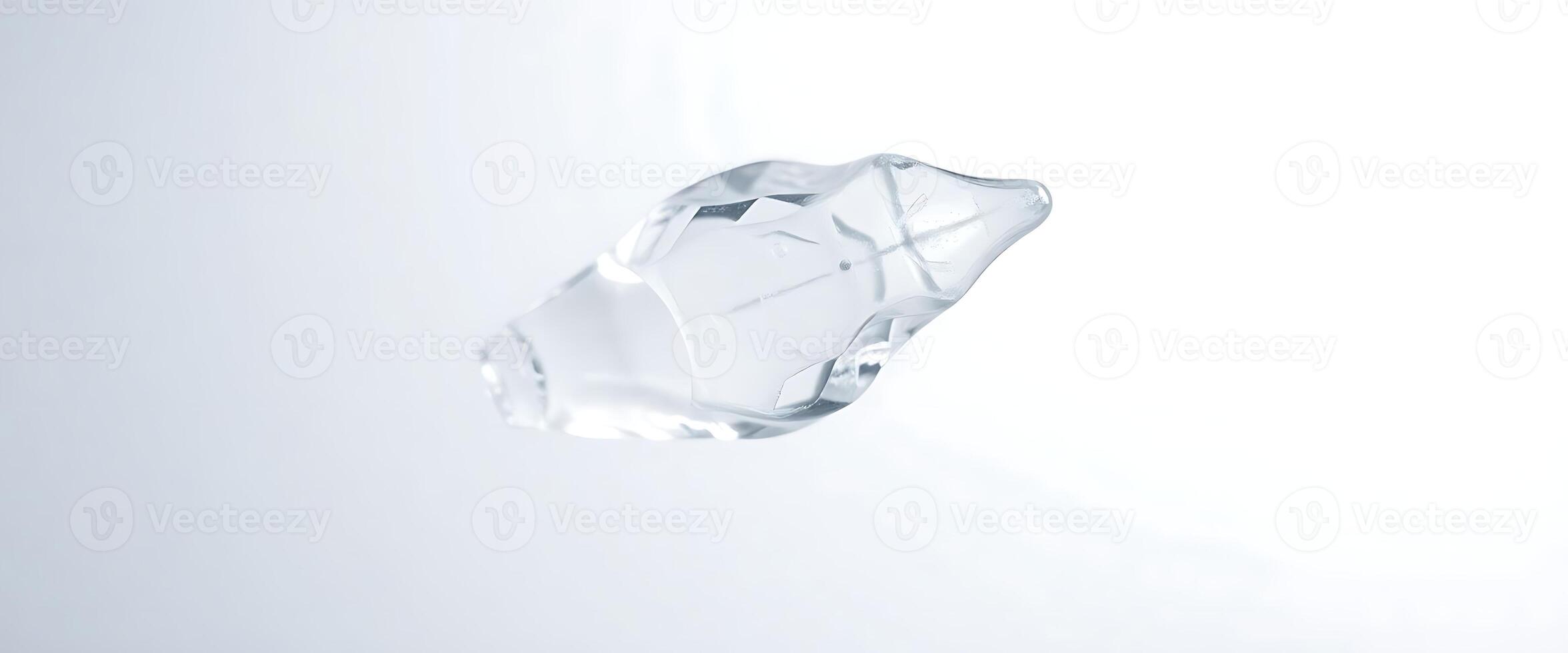 glass object floating in the air on a white background photo