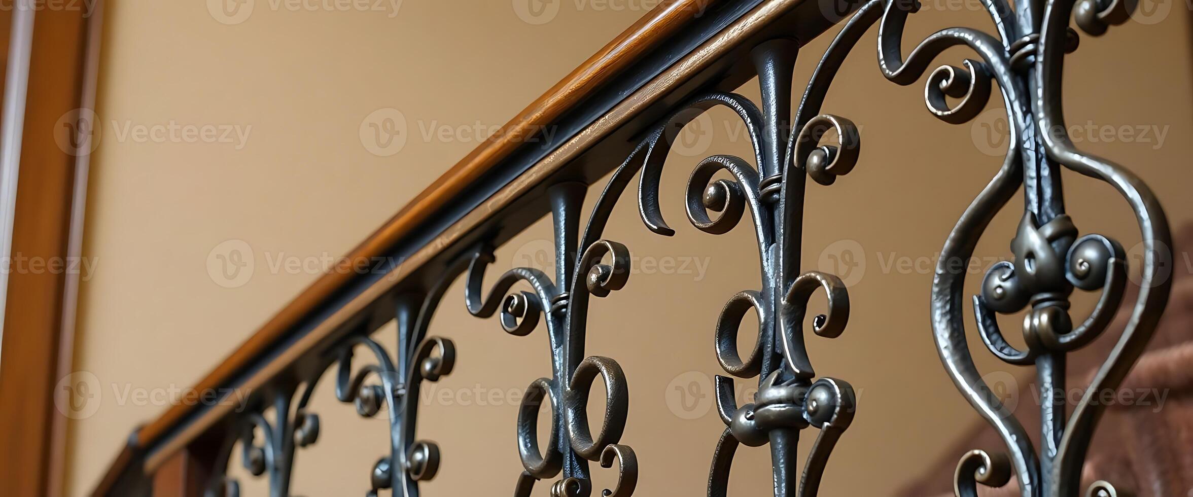 close up of a metal railing with a wooden hand rail photo