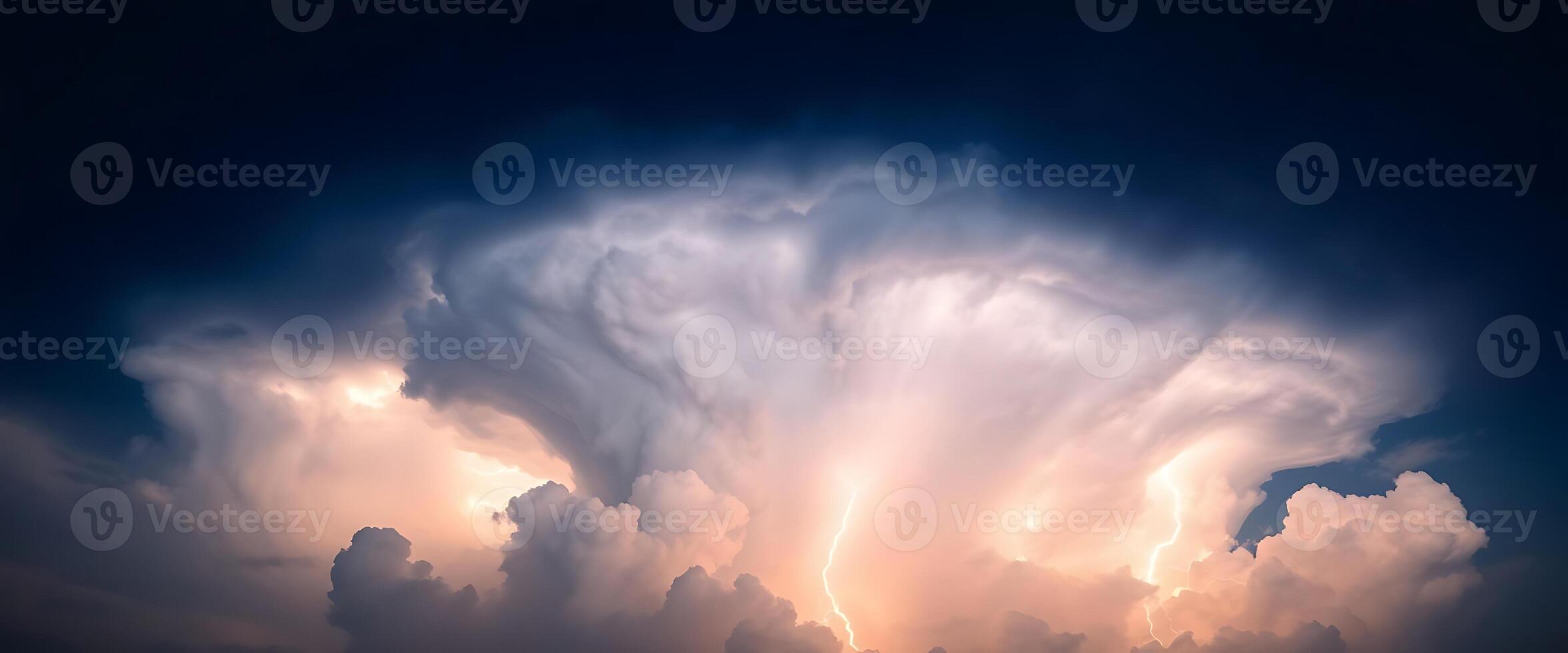 large cloud is in the middle of a dark sky photo