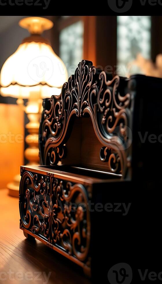 close up of a wooden table with a lamp in the background photo