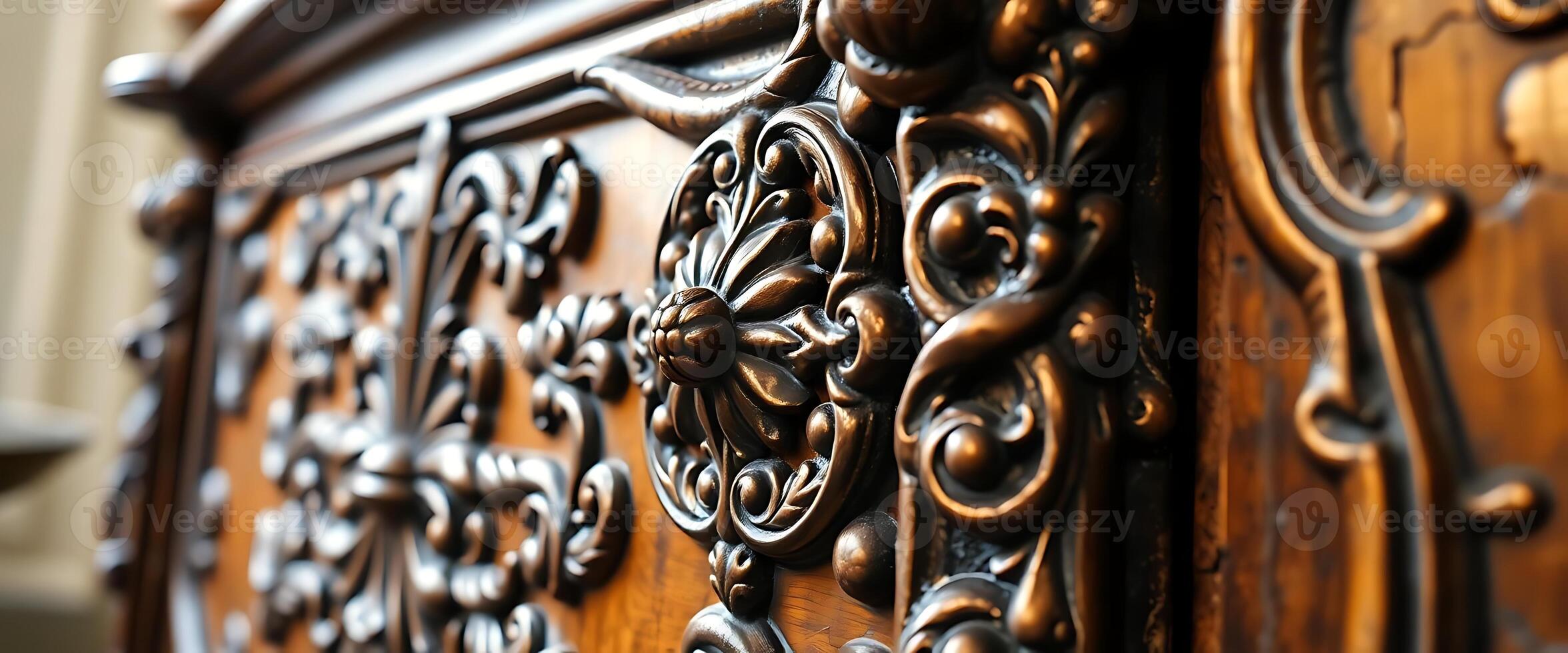 close up of a wooden cabinet with ornate carvings photo
