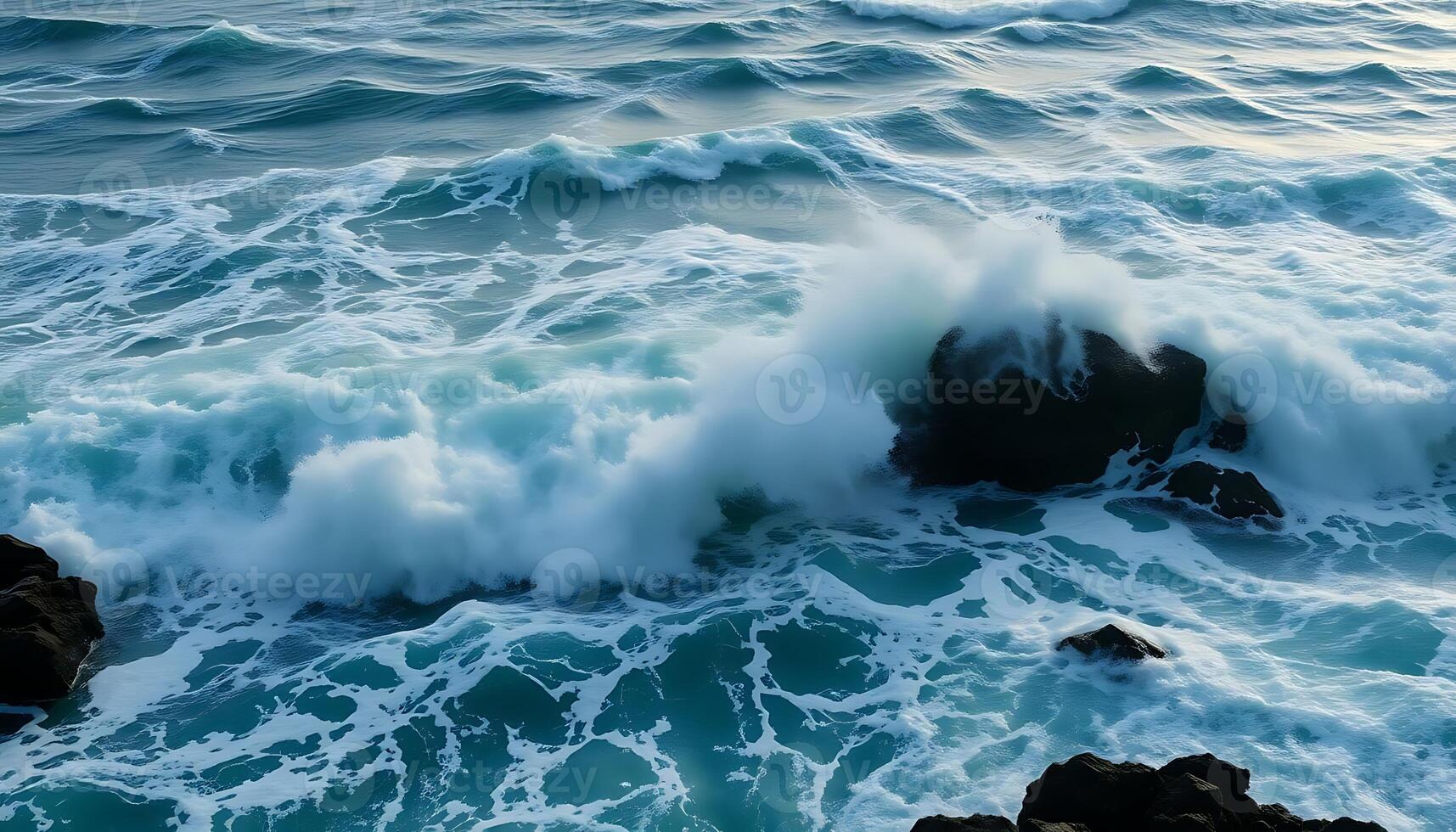 large body of water next to a rocky shore photo