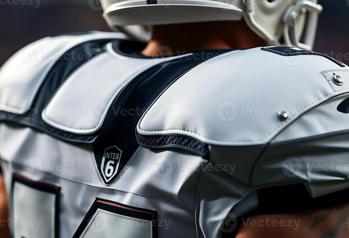 close up of a football player wearing a uniform photo