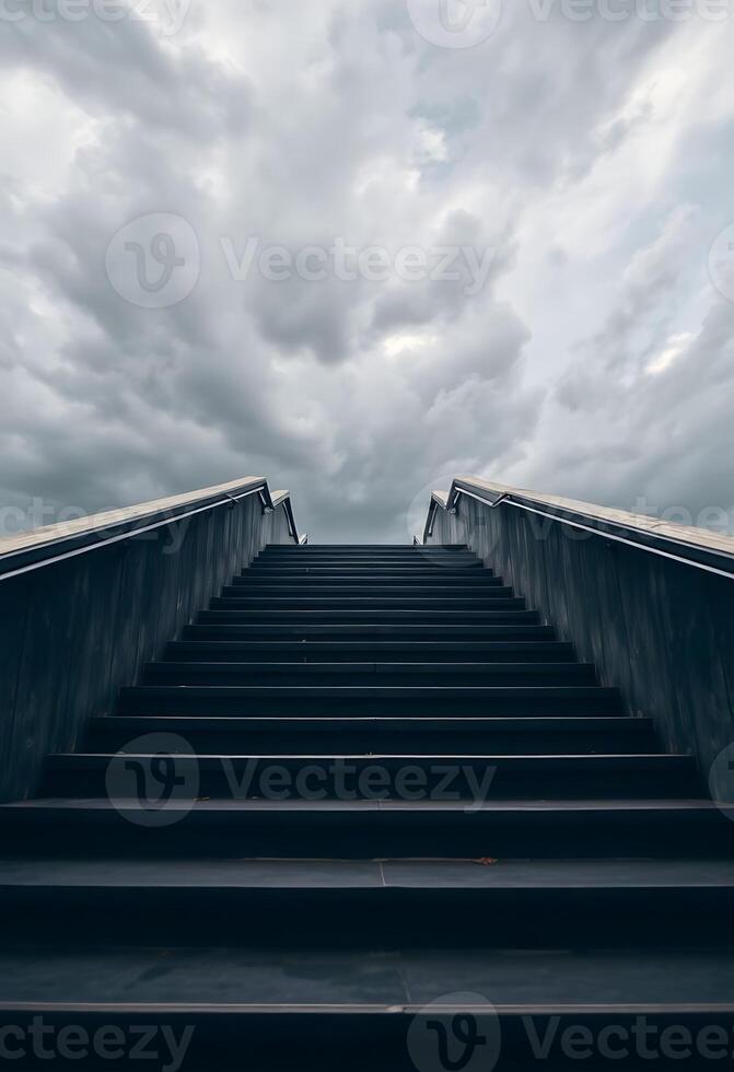 set of stairs leading up to a cloudy sky photo