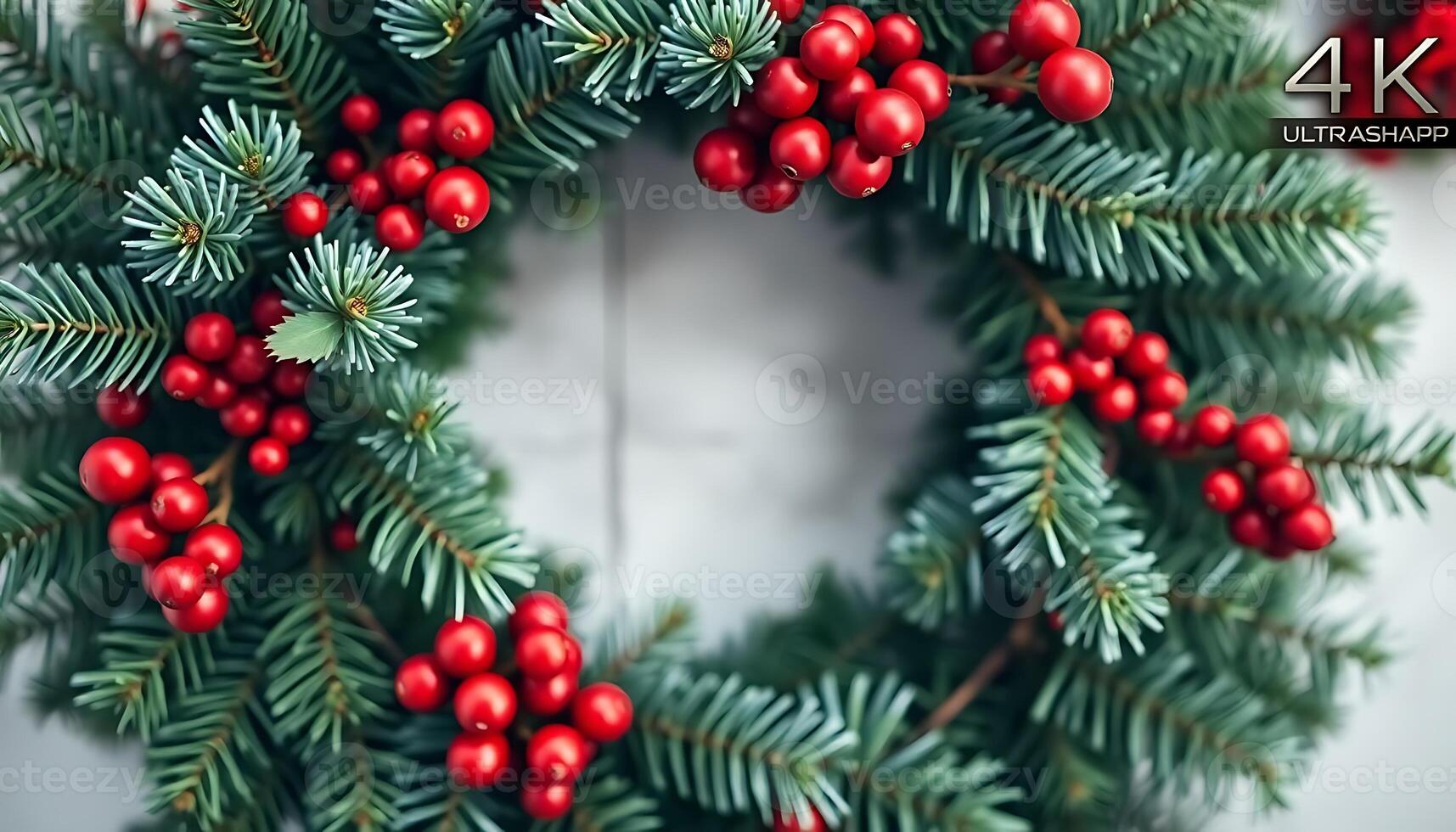 christmas wreath with red berries and pine needles photo