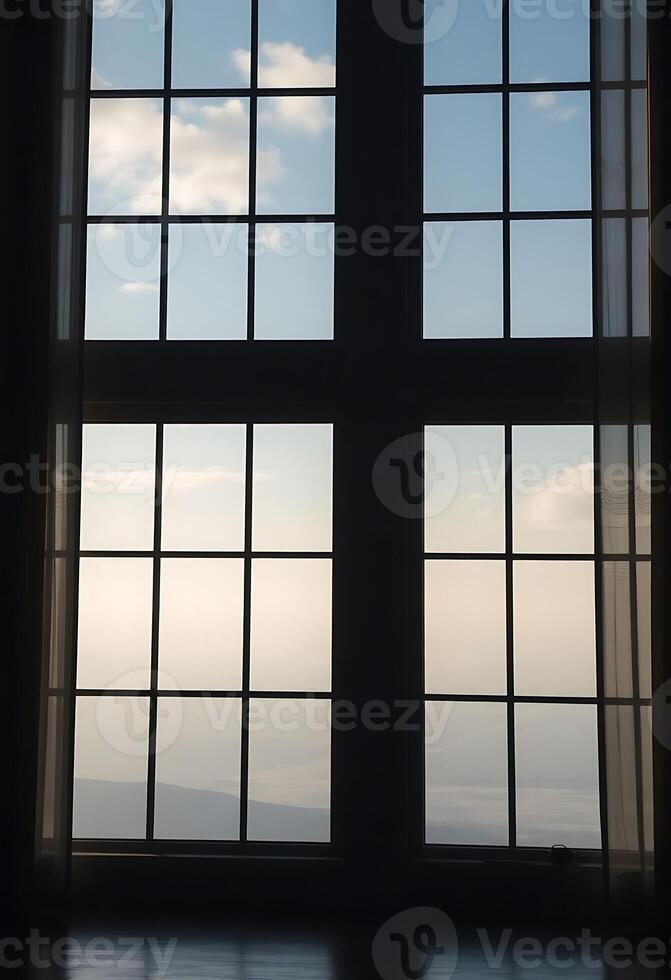 window with a view of the sky and clouds photo