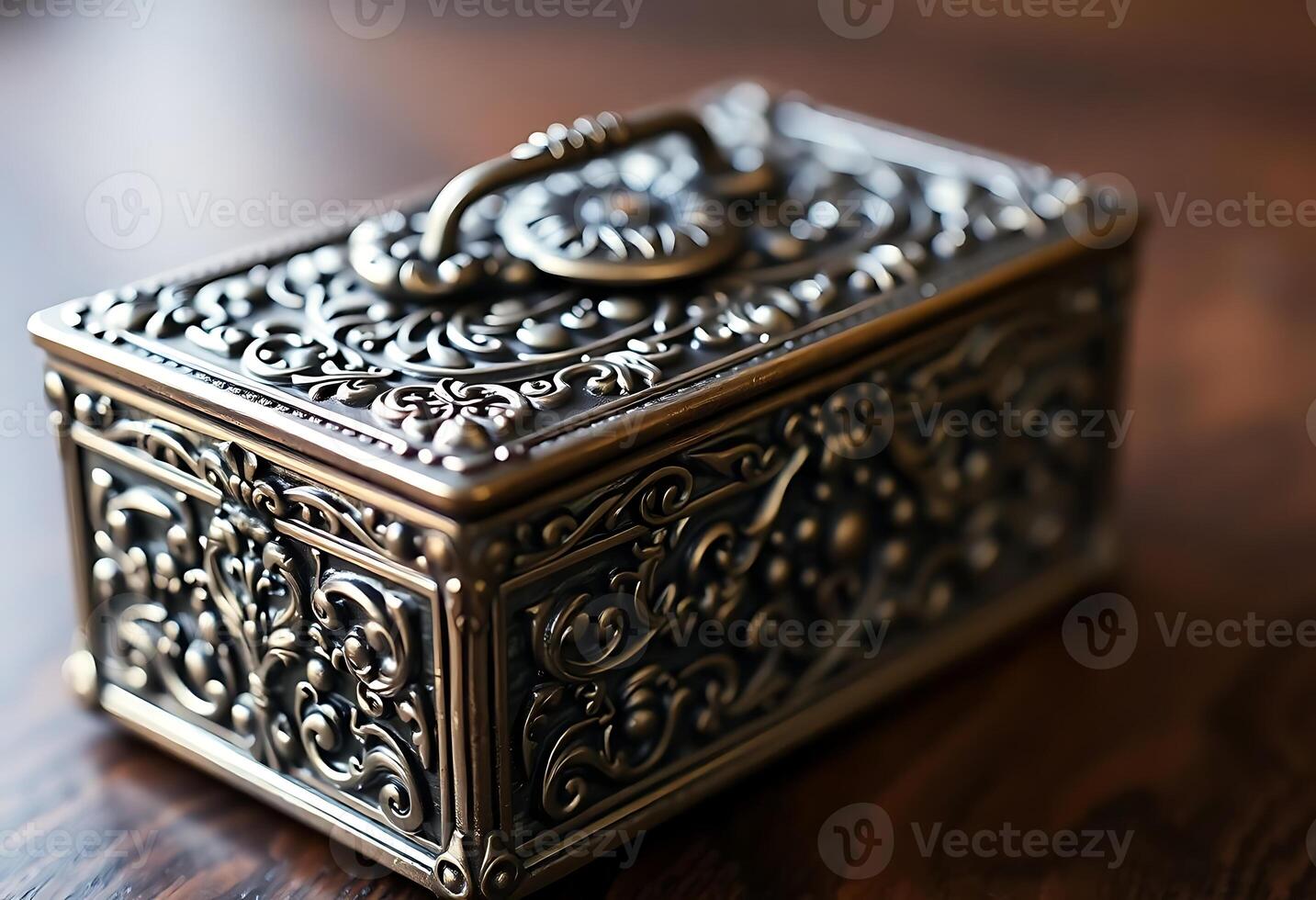 metal box sitting on top of a wooden table photo