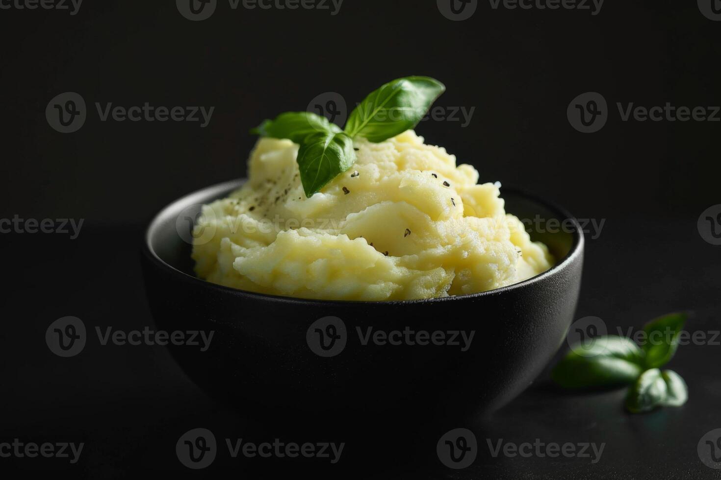 Warm comforting serving of mashed potatoes with crispy butter and fresh parsley photo