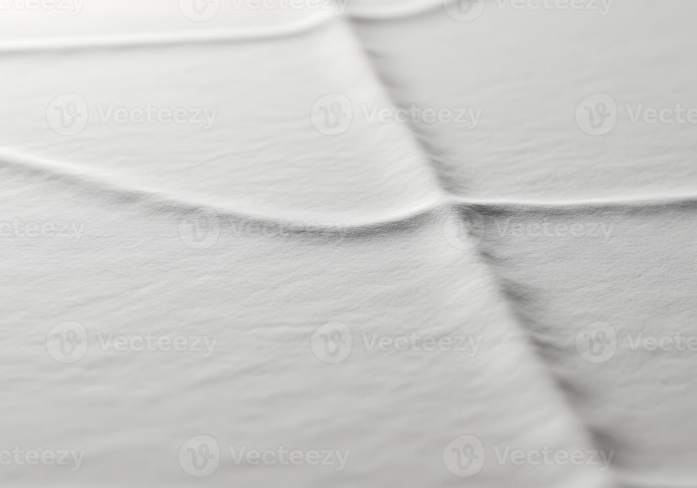 A close up of a white sheet with a wavy pattern photo