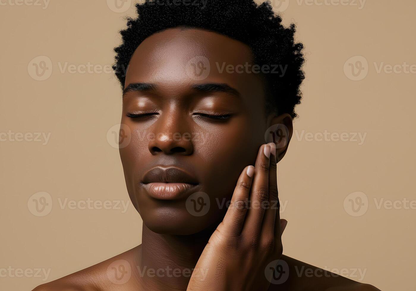 A man with his hands on his face photo