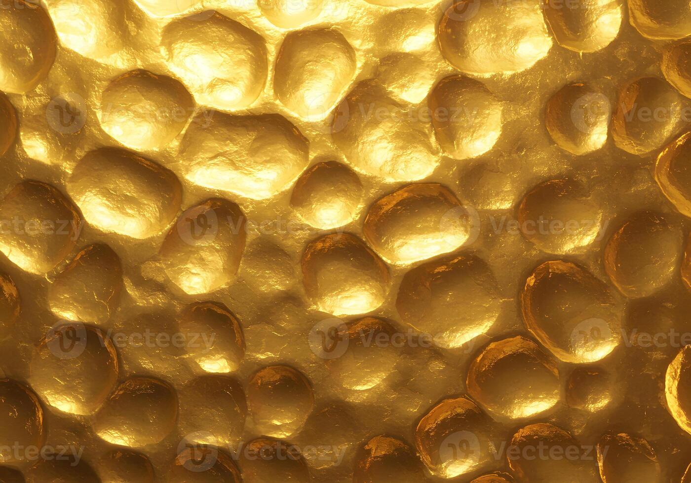 A close up of a gold surface with many small bubbles photo