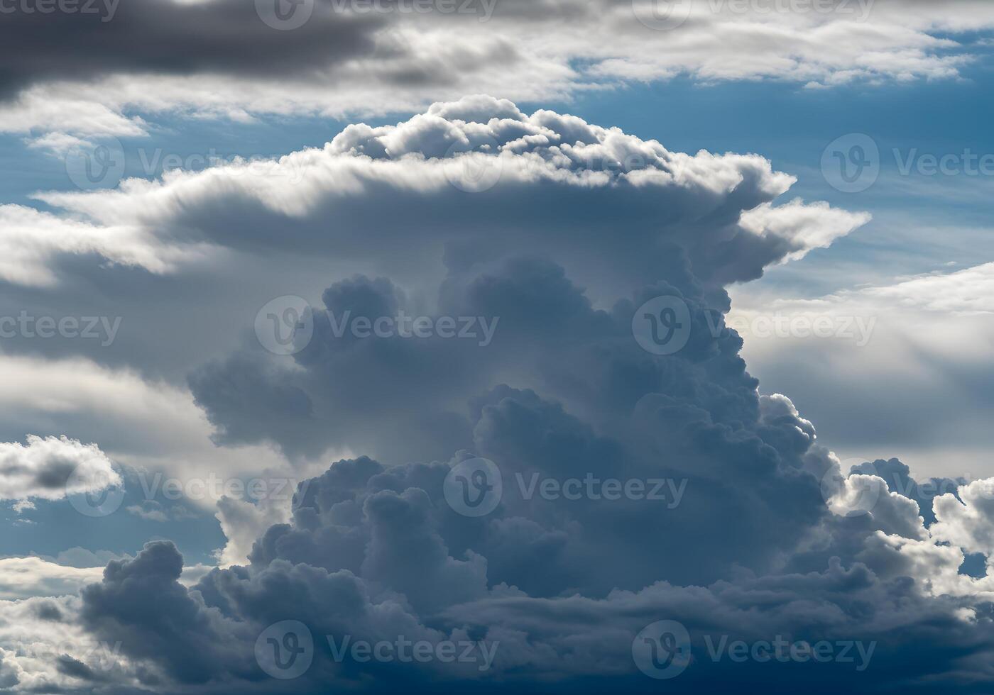 Majestic Cloud Formation Dramatic Cumulus Clouds Against Blue Sky - Weather, Meteorology, Natural Beauty. photo