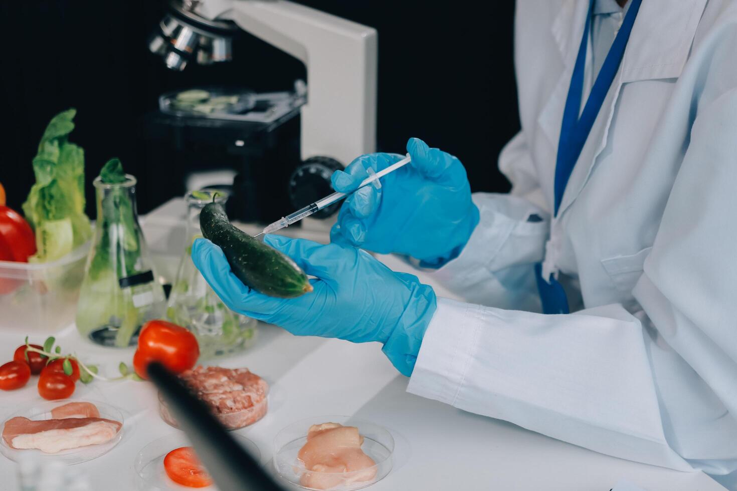 A person in a lab coat is holding a knife photo