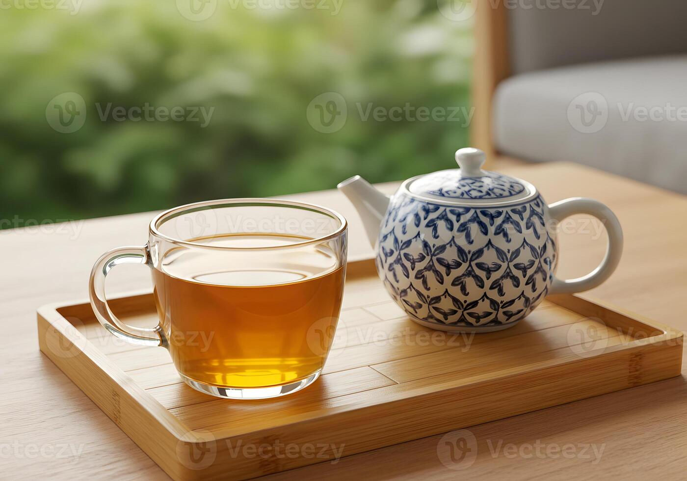 Tea mug and teapot on a wooden tray a relaxing morning composition photo