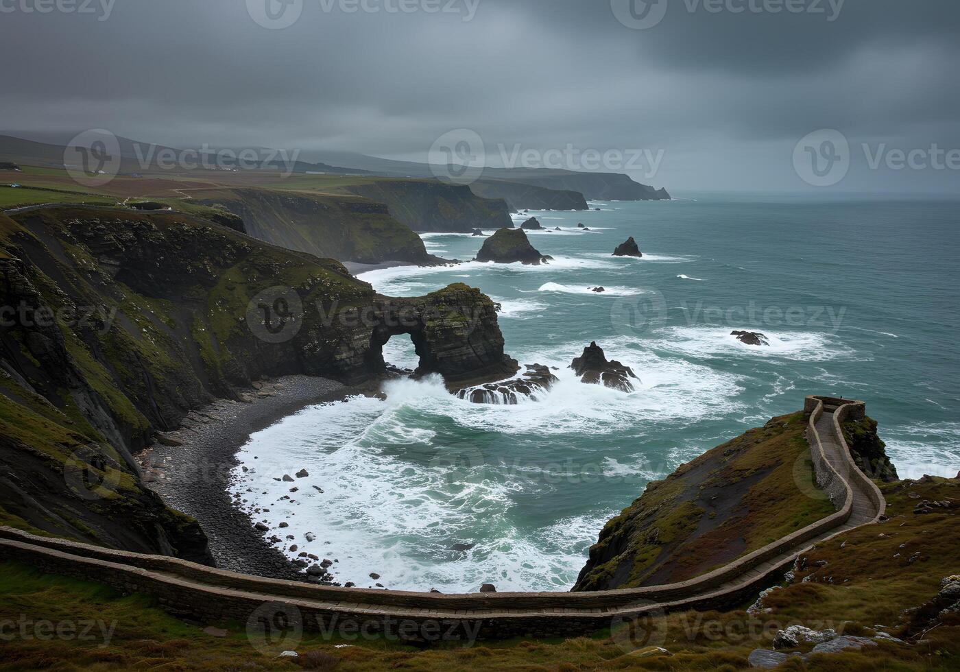 Coastal road winding through rocky landscape photo