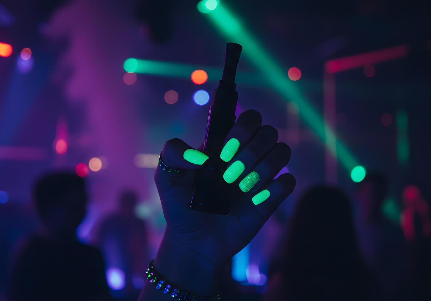 Hand with electronic vaping device in nightclub photo