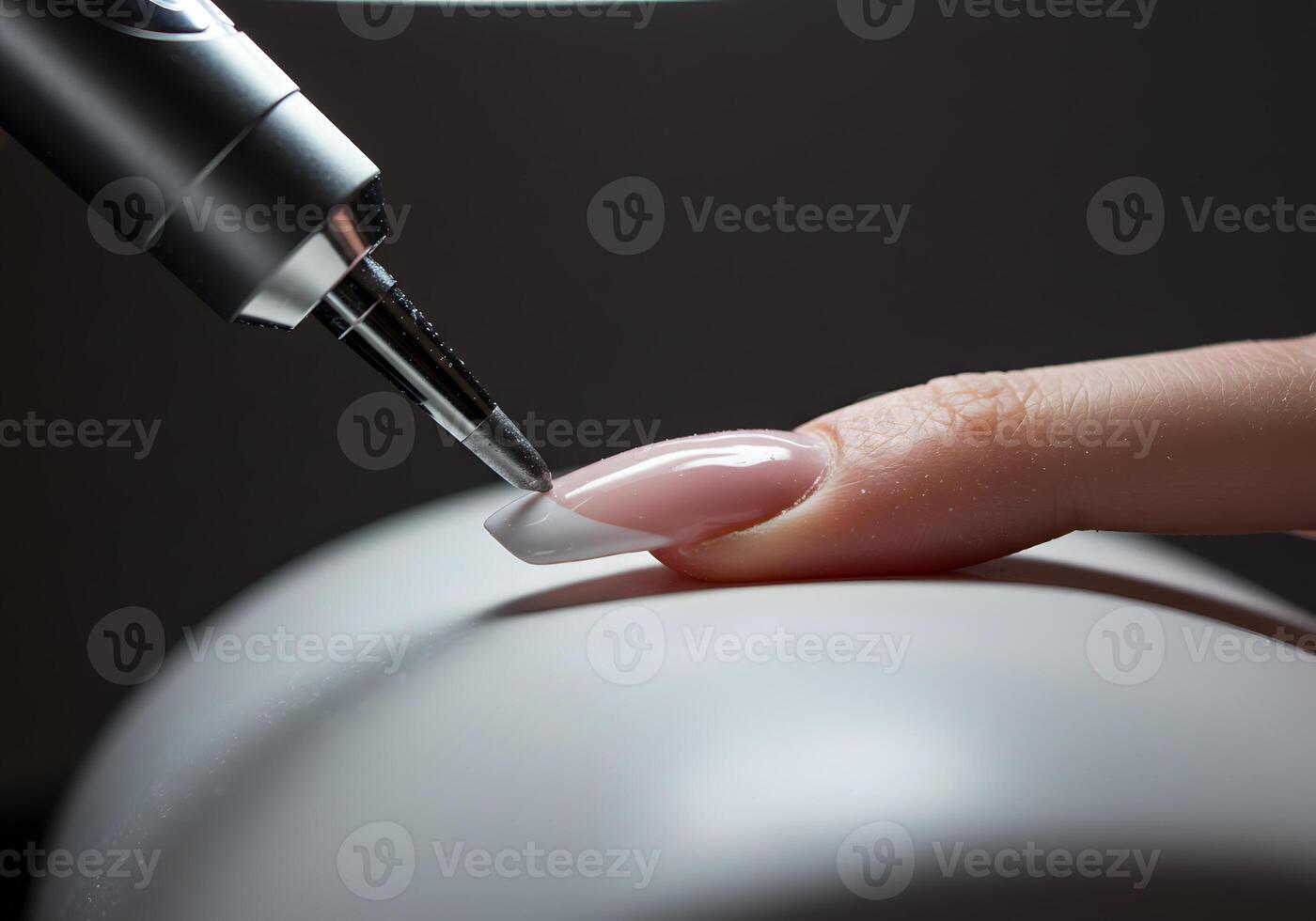 Manicure treatment process closeup photo