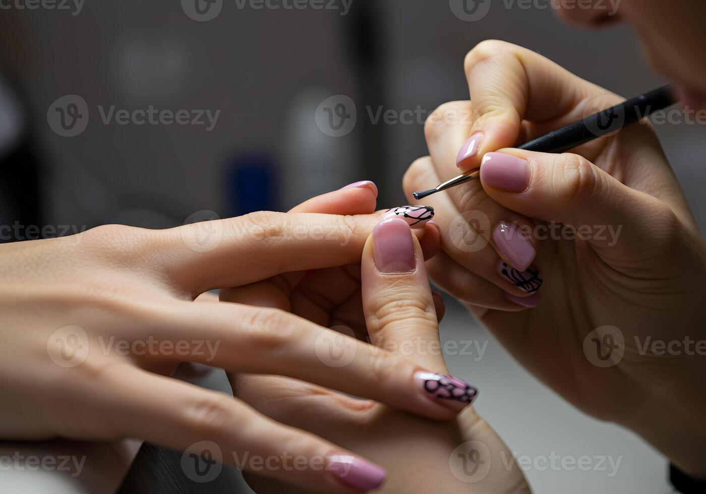 Nail art application closeup photo
