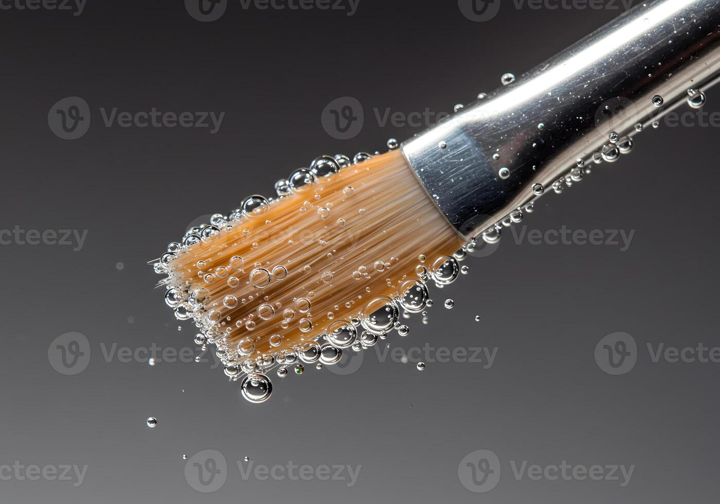 Water droplets on paintbrush head photo