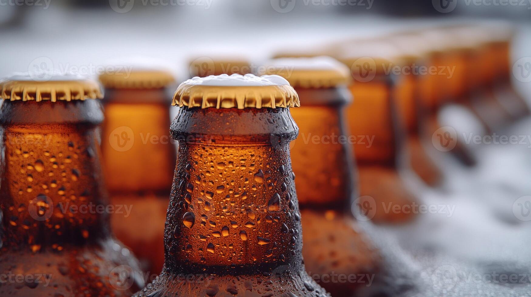 A row of beer bottles in the snow photo