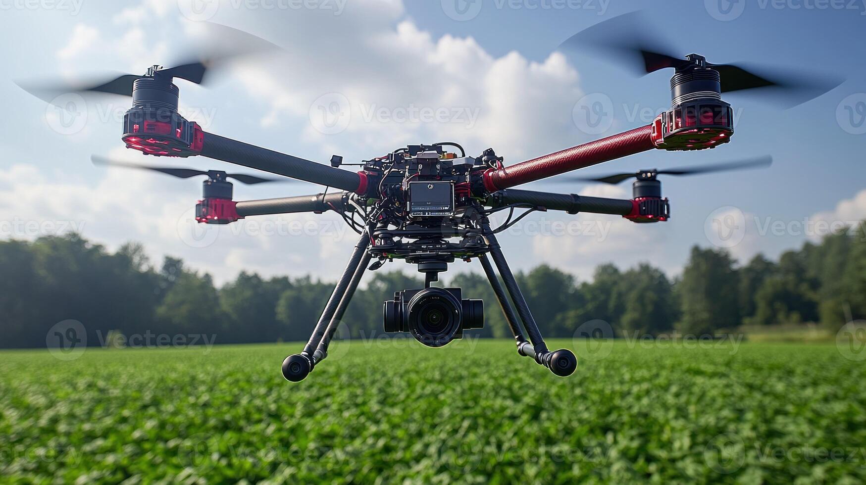 A drone flying over a field of green grass photo