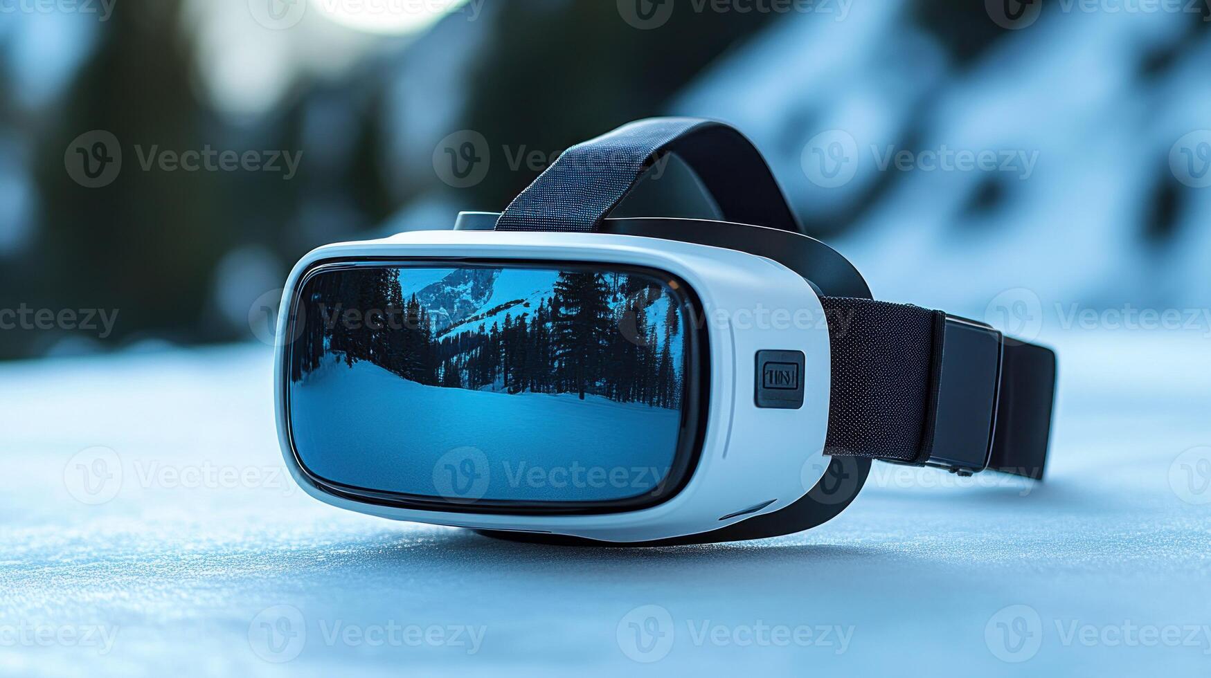 A pair of virtual reality goggles on a snowy surface photo
