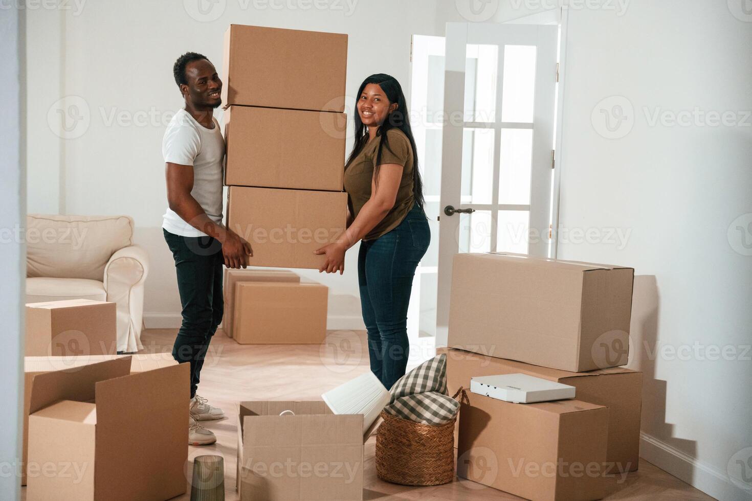 African American, couple are moving into new house photo