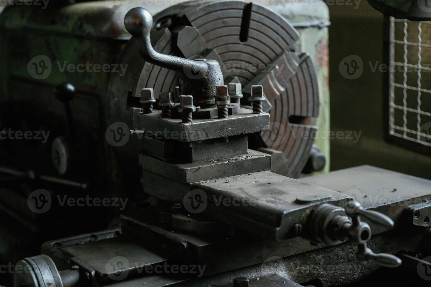 Vintage industrial lathe in an old workshop setting photo