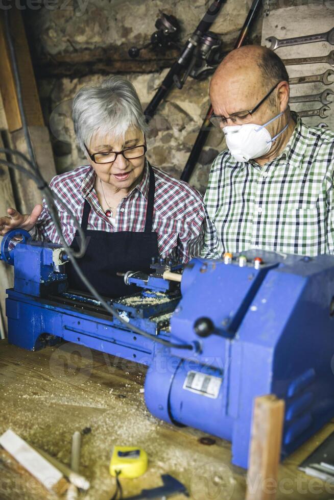 Couple workers in carpentry photo