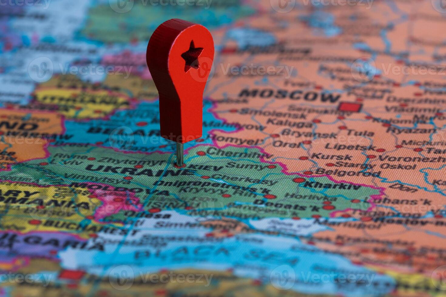 Red pin, point on the map of Ukraine. Concept travel background photo