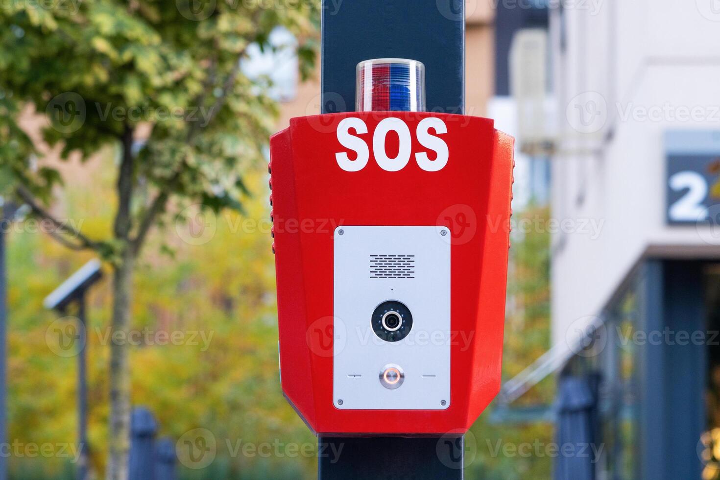 SOS, police, emergency button in a public park. photo