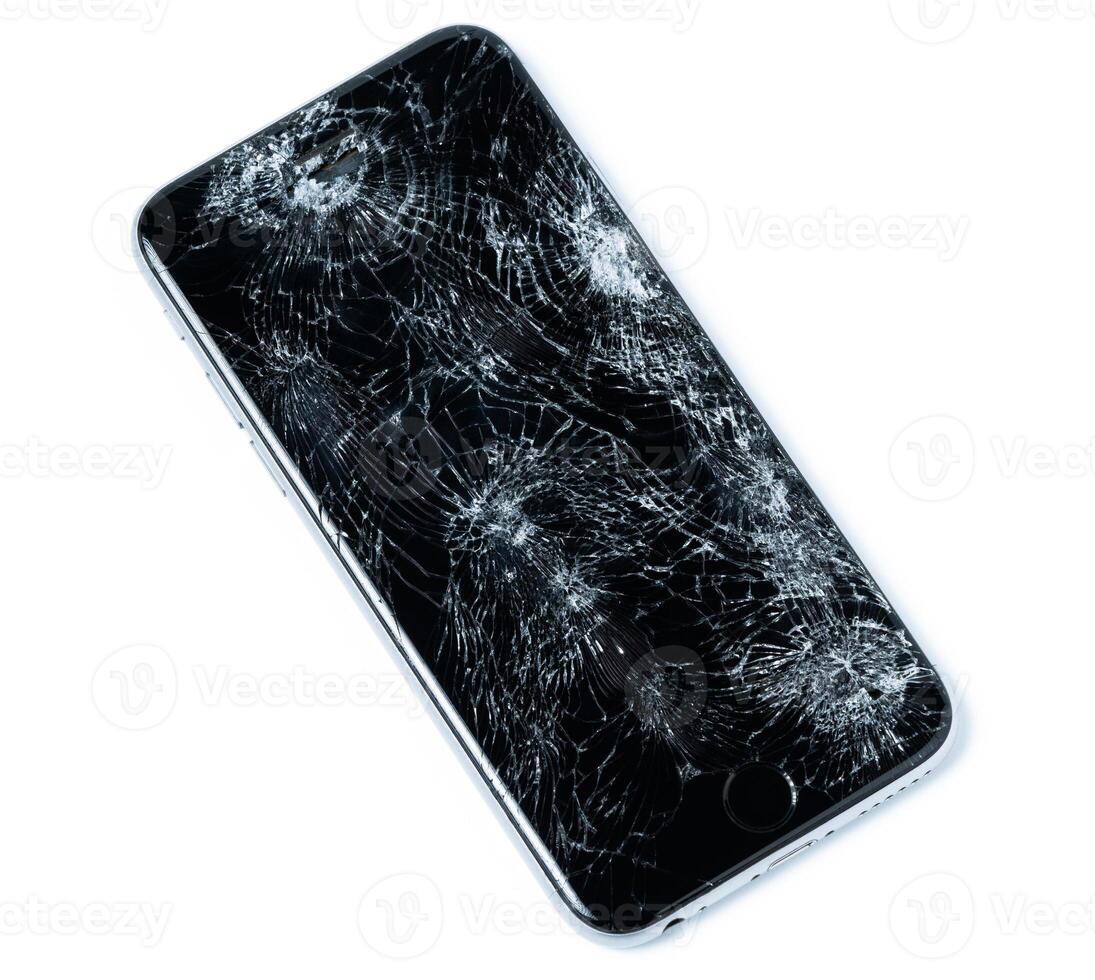 Smartphone drop to the floor and screen damage broken isolated on white background photo
