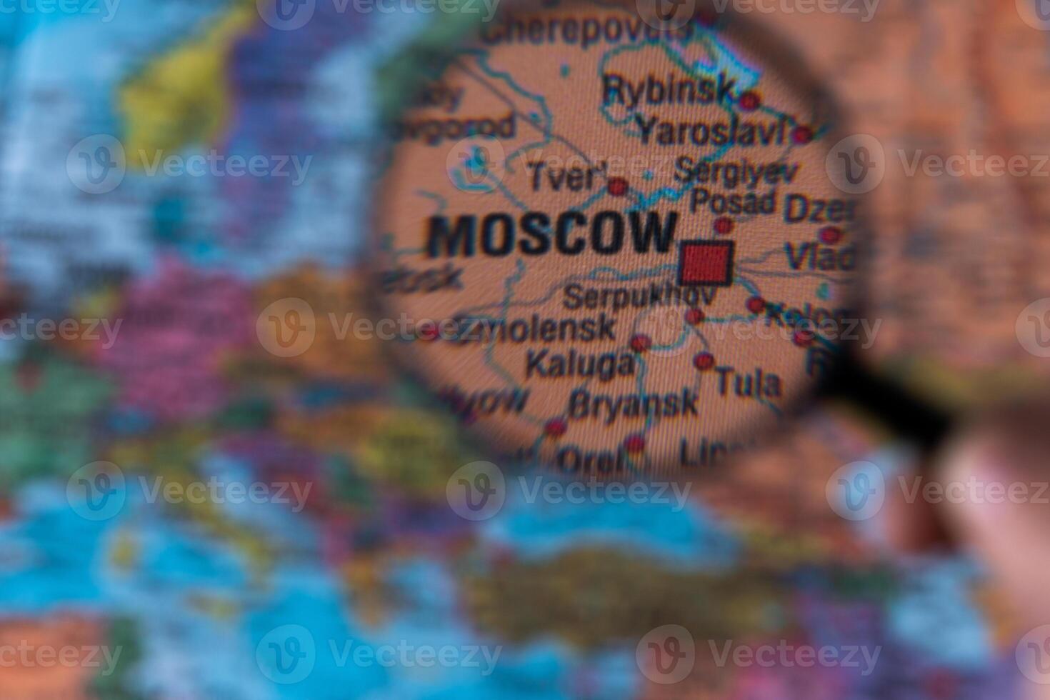 Map of Moscow through magnifying glass. photo