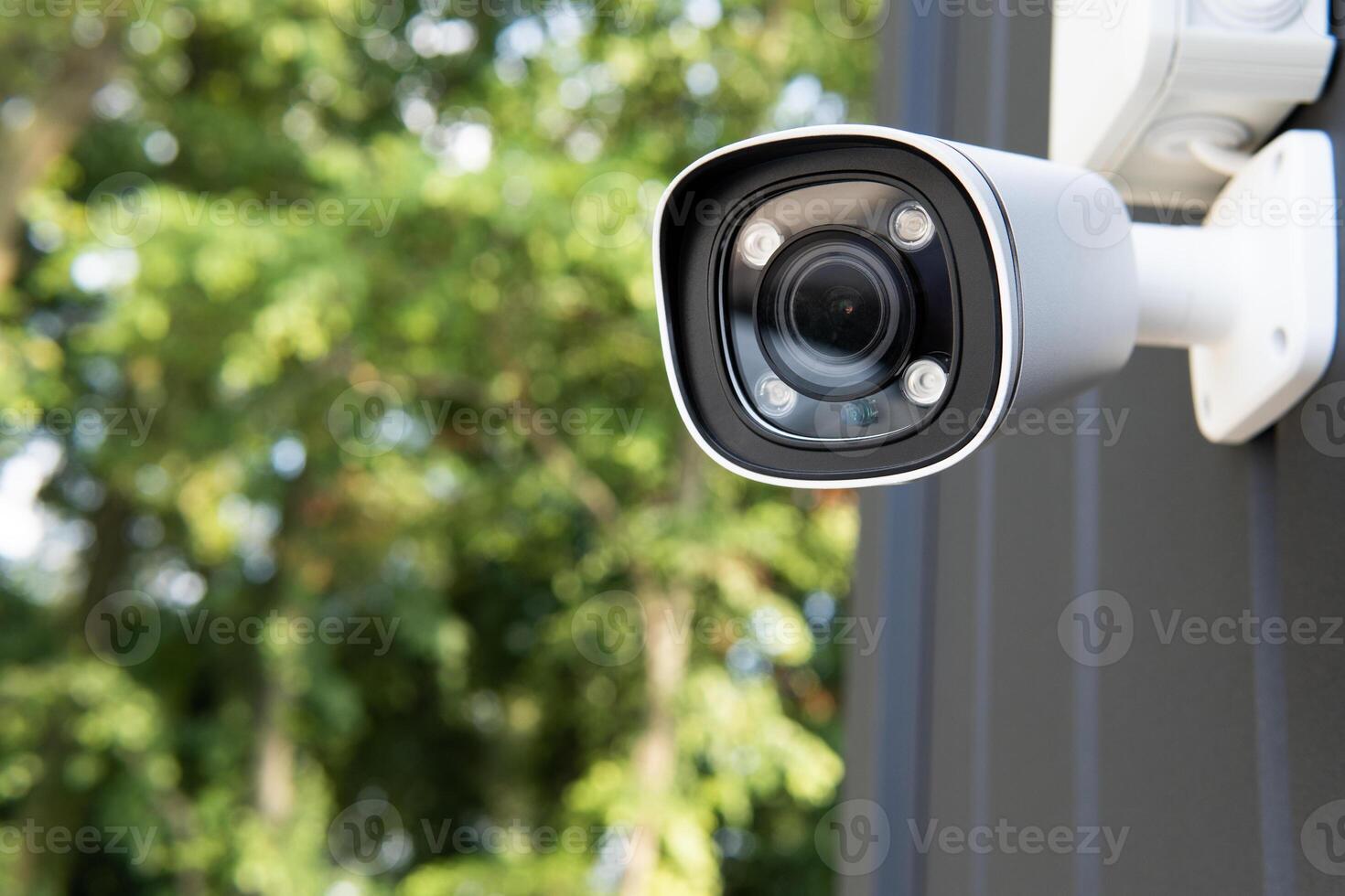 IP CCTV camera install by have water proof cover to protect camera with home security system concept with blur background photo
