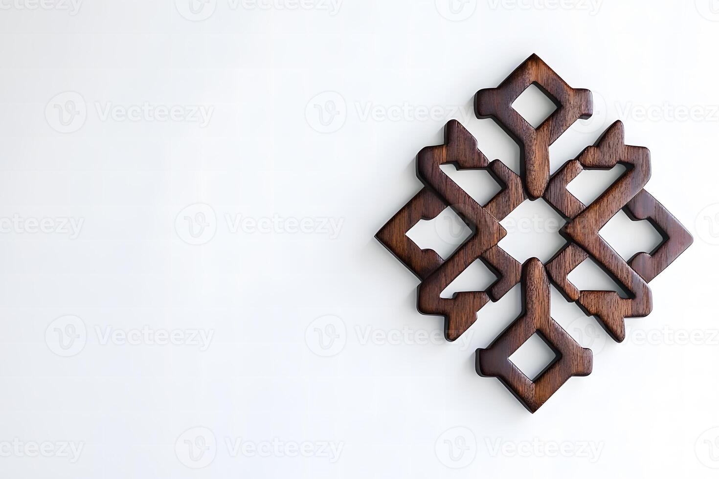 Intricately Carved Wooden Ornament Against a Minimalist Background Highlighting Unique Design Elements and Craftsmanship Showcased in Contemporary Decor photo
