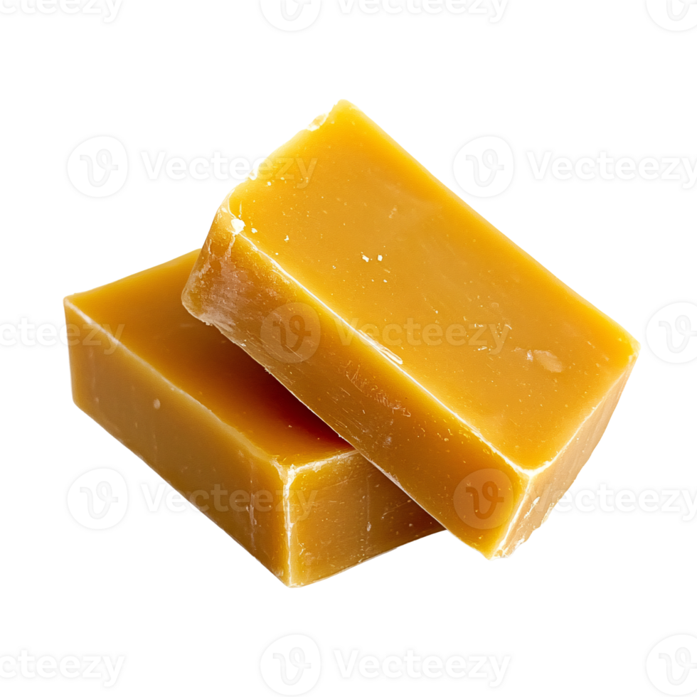 Two blocks of natural beeswax on a transparent background, showcasing its raw form and golden color Concept of beekeeping, cosmetics, and candle making png