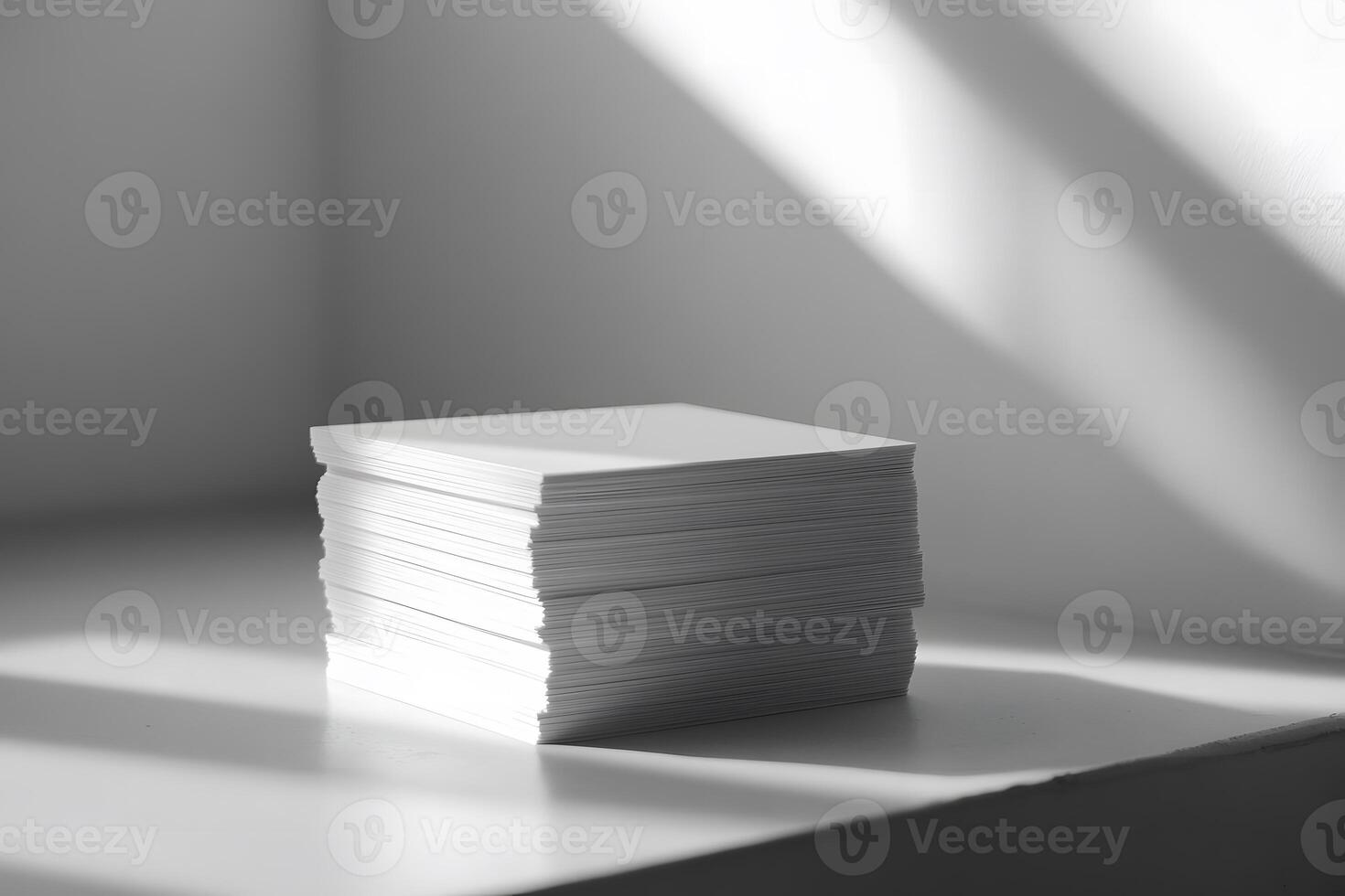 Stacked Blank White Paper Sheets on a Light Surface with Soft Shadows Creating an Artistic and Minimalist Composition for Creative Projects photo
