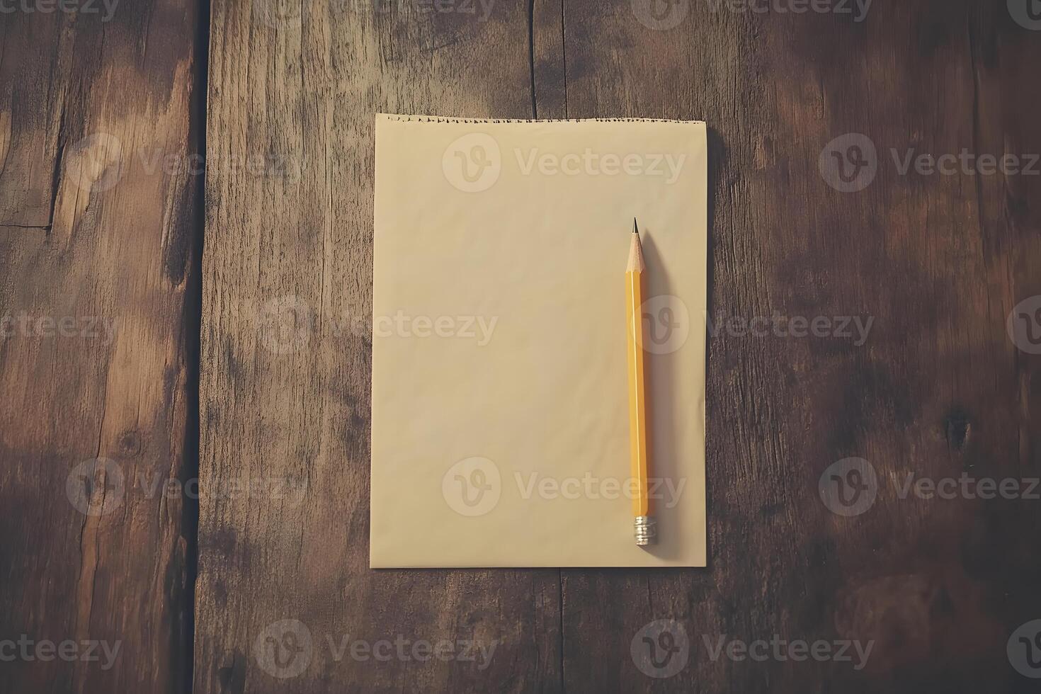 Blank notepad and yellow pencil on rustic wooden table creating a perfect workspace for creative writing, sketching, and brainstorming ideas in a cozy atmosphere photo