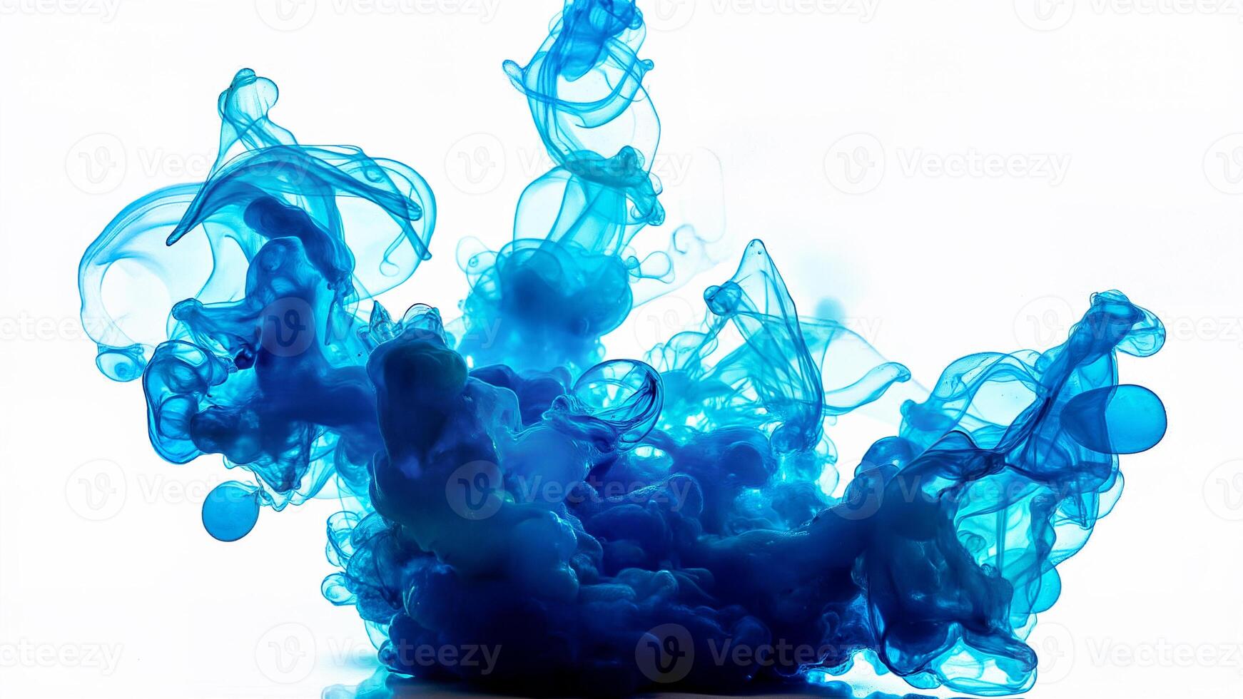 Blue Ink Dropping in Water Isolated photo