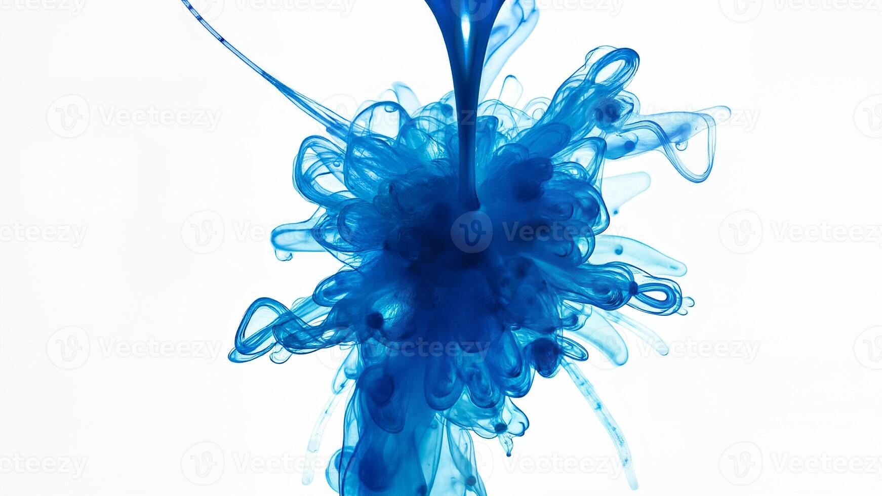 Blue Ink Dropping in Clear Water Isolated photo