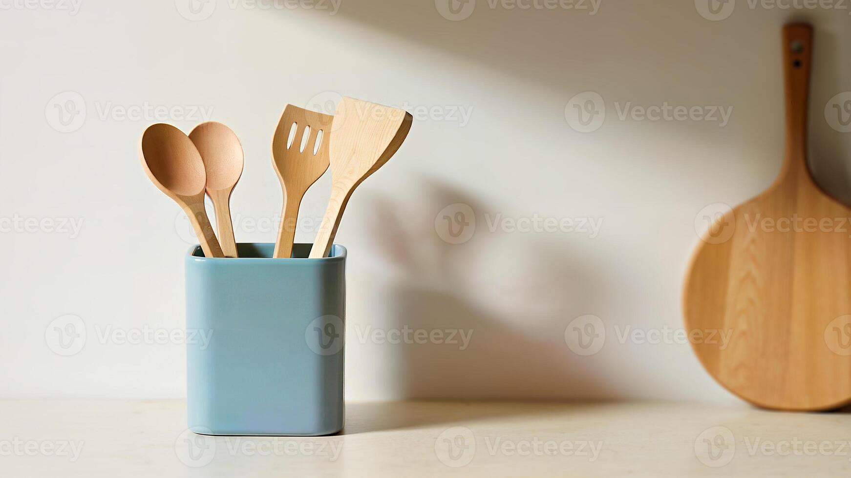 Modern Kitchen Utensils in Ceramic Holder photo